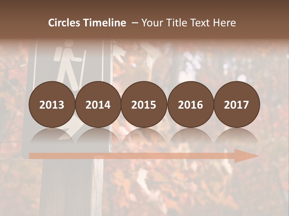 Sign Points To A Hiking Trail In Woods In Autumn PowerPoint Template