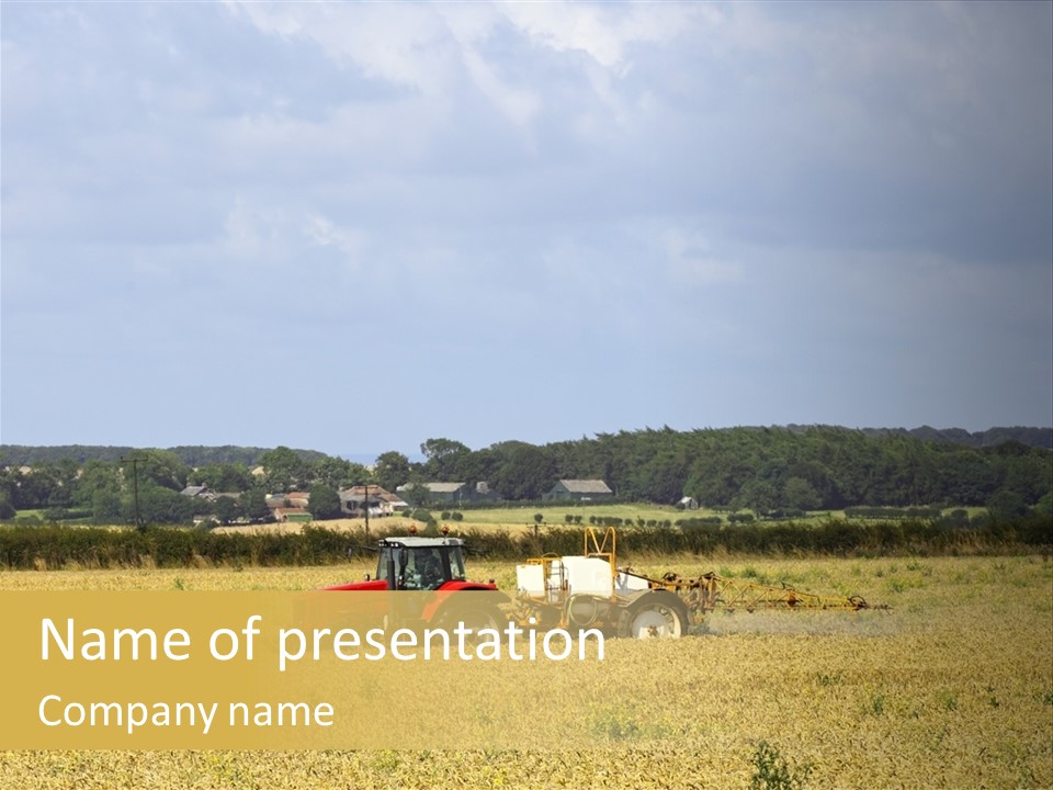 A Tractor Mounted Crop Sprayer In Action In A Wheatfield PowerPoint Template