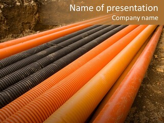 Orange And Black Plastic Pipes In A Ditch PowerPoint Template