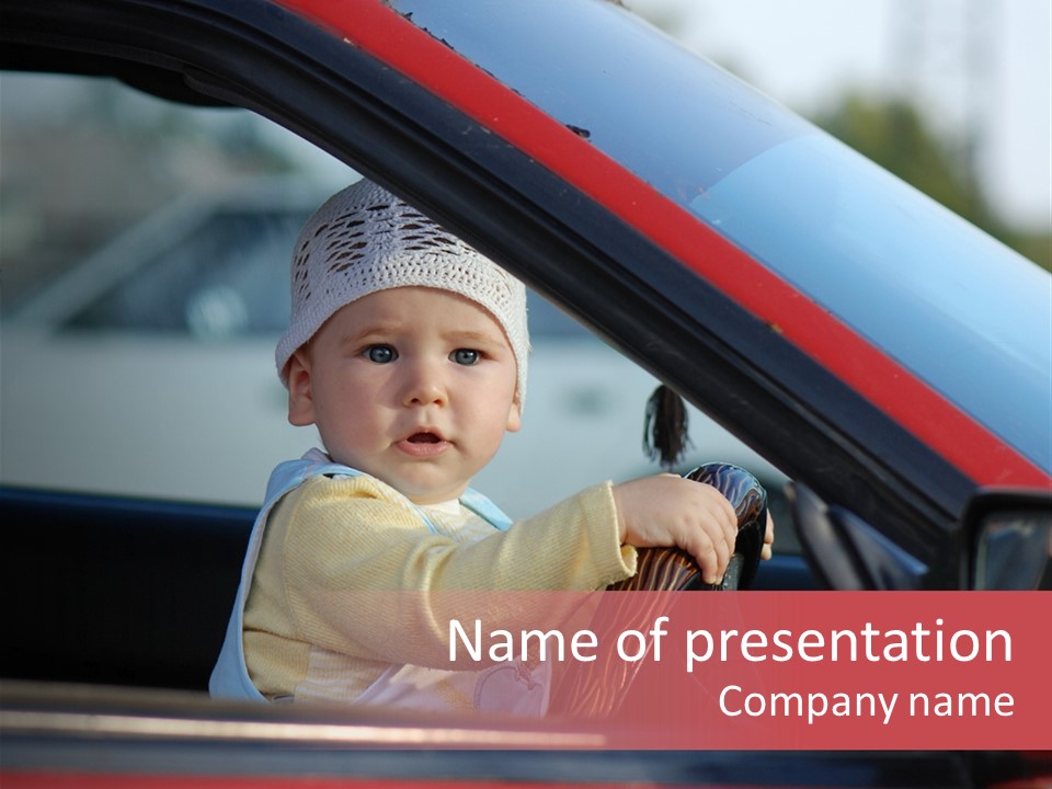 A Little Baby Driving Car PowerPoint Template