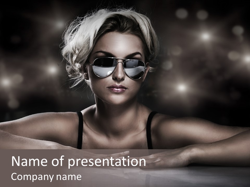 Studio Shot Of Young Blonde Wearing Stylish Sunglasses PowerPoint Template