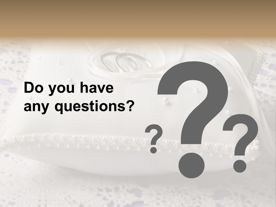 A Wedding Ring Pillow On A Lace Tablecloth PowerPoint Template