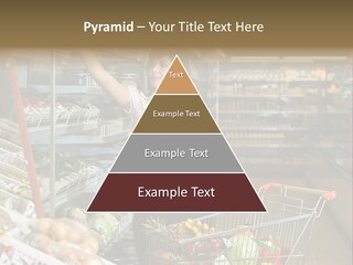Beautiful Young Woman Standing With A Trolley At A Supermarket PowerPoint Template