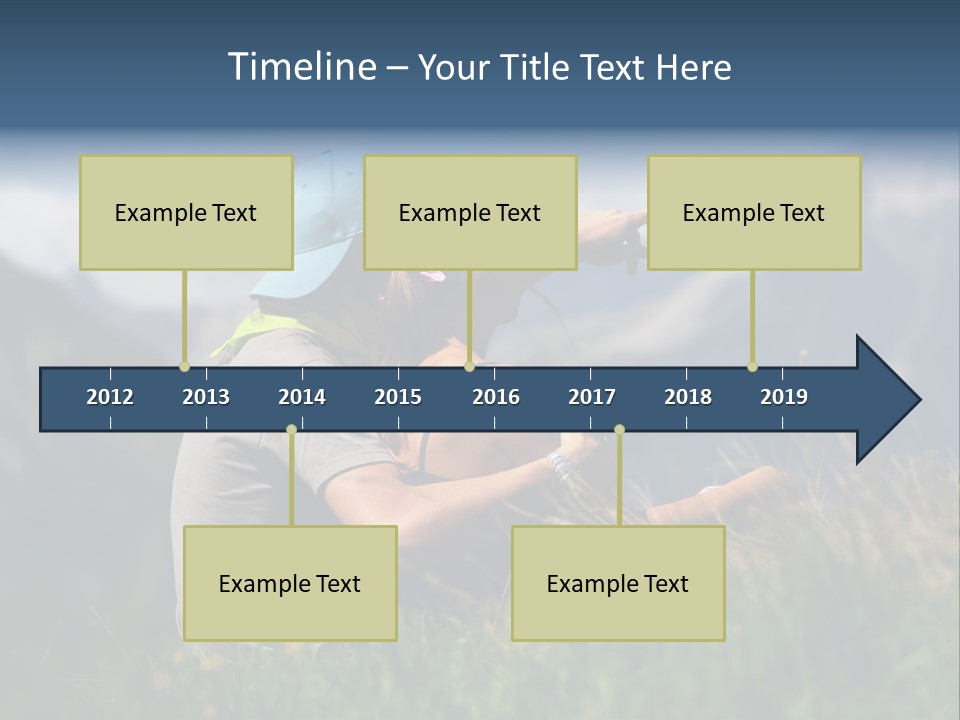 A Couple Of People Sitting On Top Of A Grass Covered Field PowerPoint Template