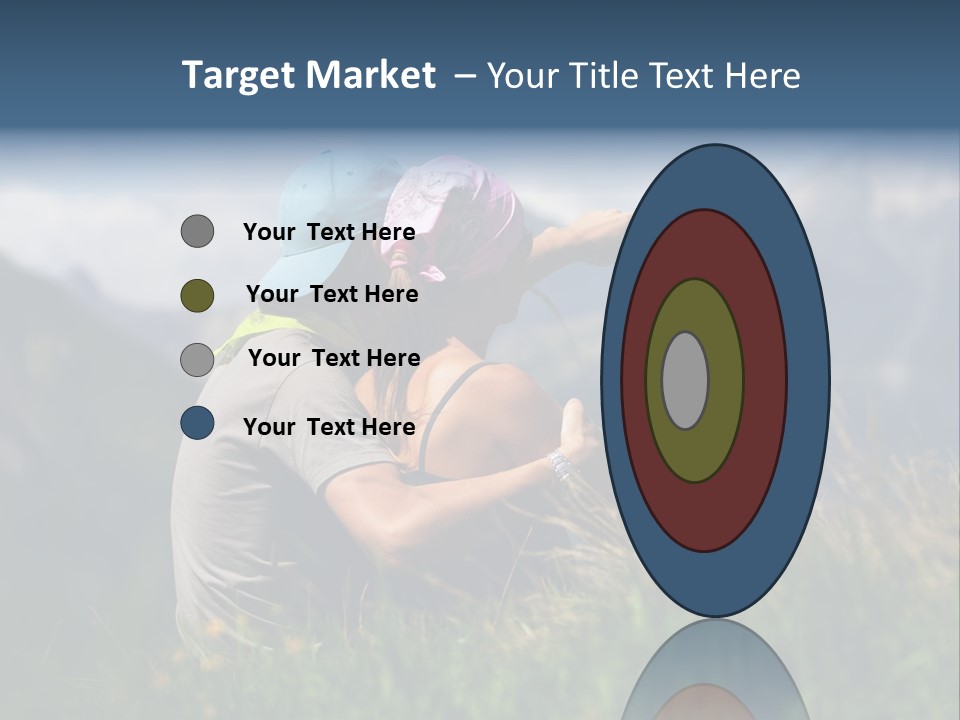 A Couple Of People Sitting On Top Of A Grass Covered Field PowerPoint Template