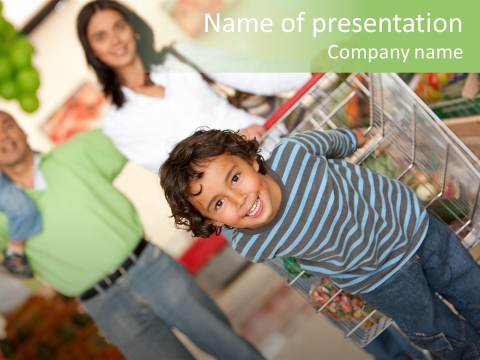 A Young Boy Standing In Front Of A Shopping Cart PowerPoint Template