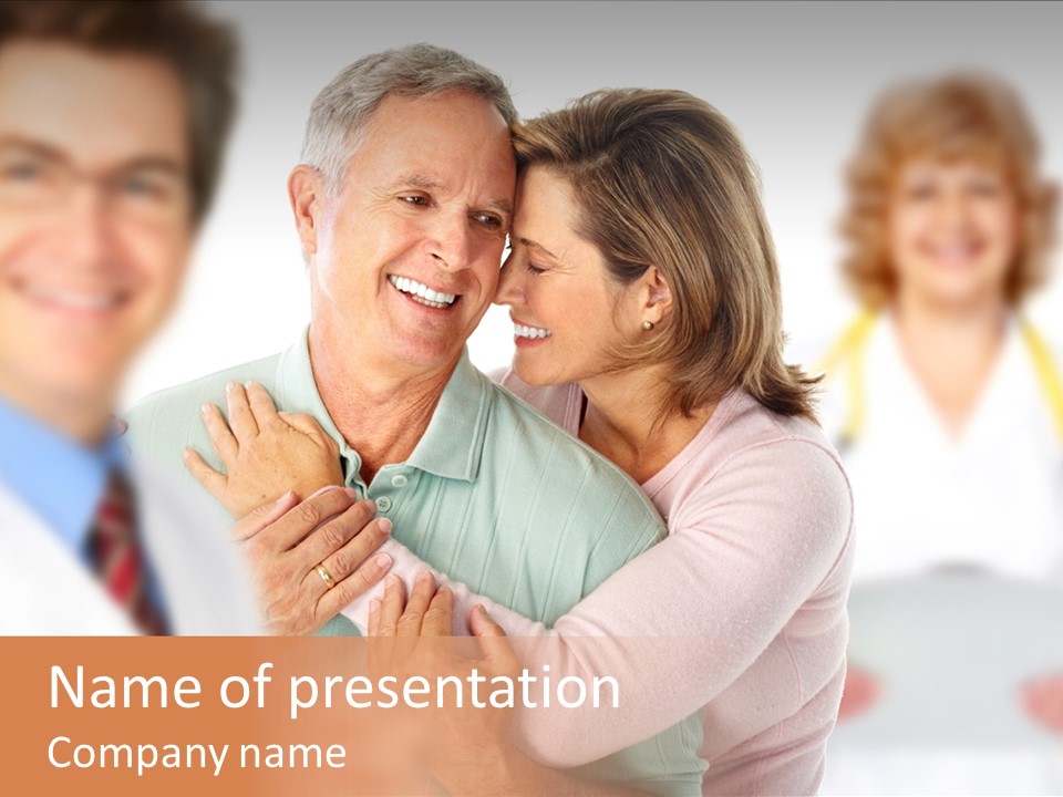 A Man And Woman Hugging Each Other In Front Of A Group Of People PowerPoint Template