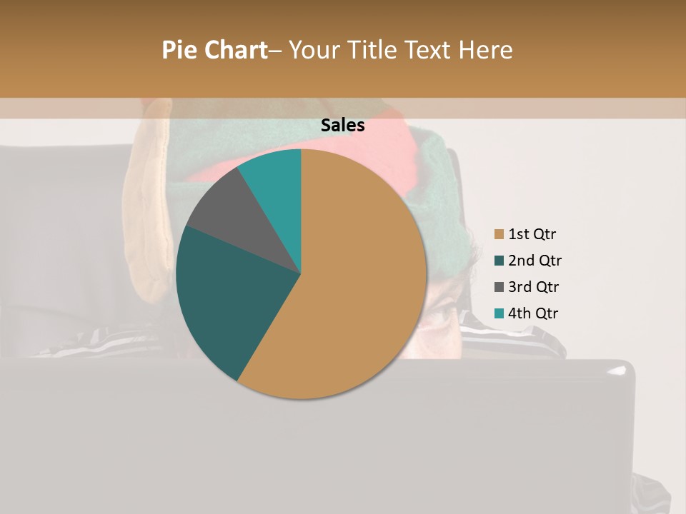 A Man Wearing A Elf Hat Sitting In Front Of A Laptop PowerPoint Template