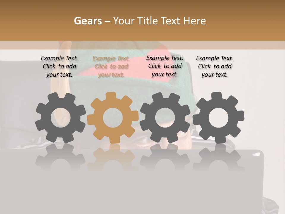 A Man Wearing A Elf Hat Sitting In Front Of A Laptop PowerPoint Template