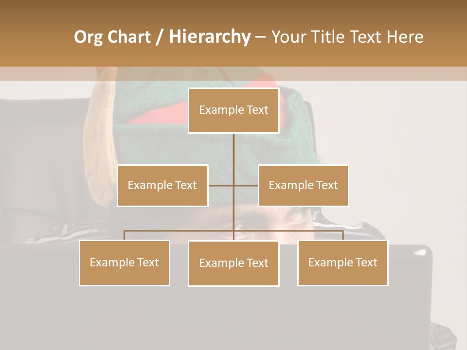 A Man Wearing A Elf Hat Sitting In Front Of A Laptop PowerPoint Template