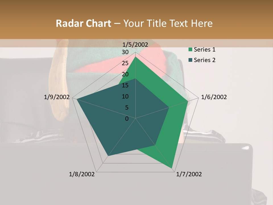 A Man Wearing A Elf Hat Sitting In Front Of A Laptop PowerPoint Template