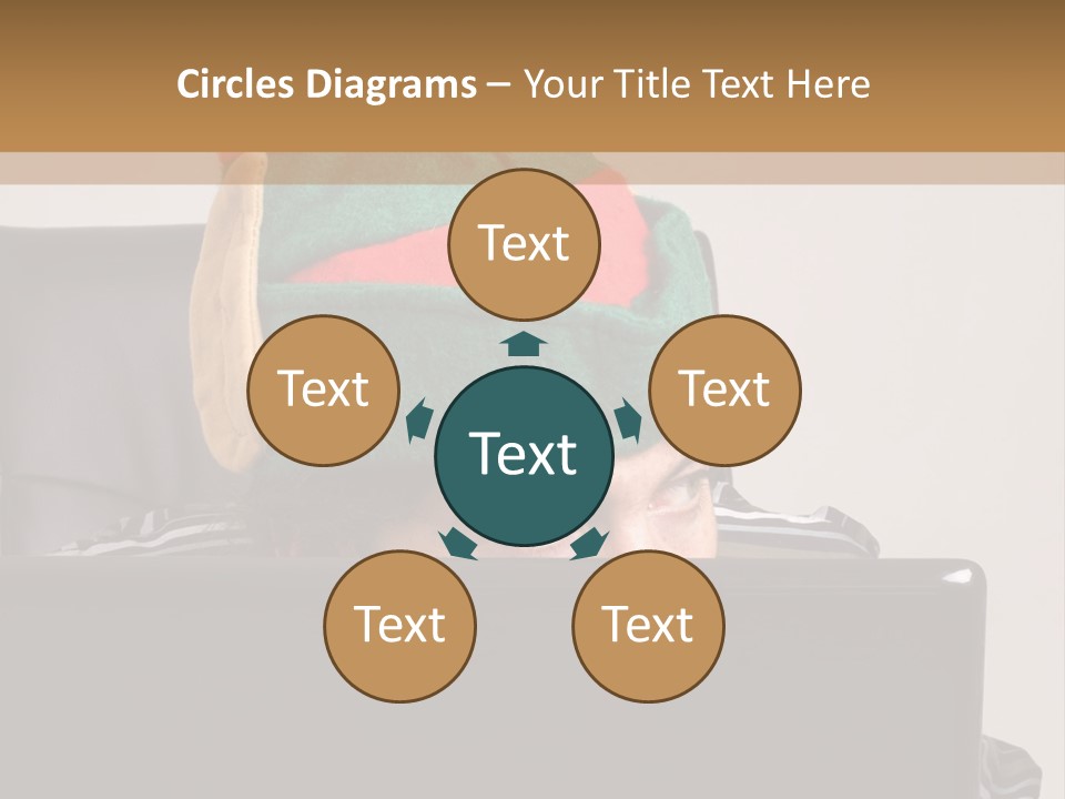 A Man Wearing A Elf Hat Sitting In Front Of A Laptop PowerPoint Template