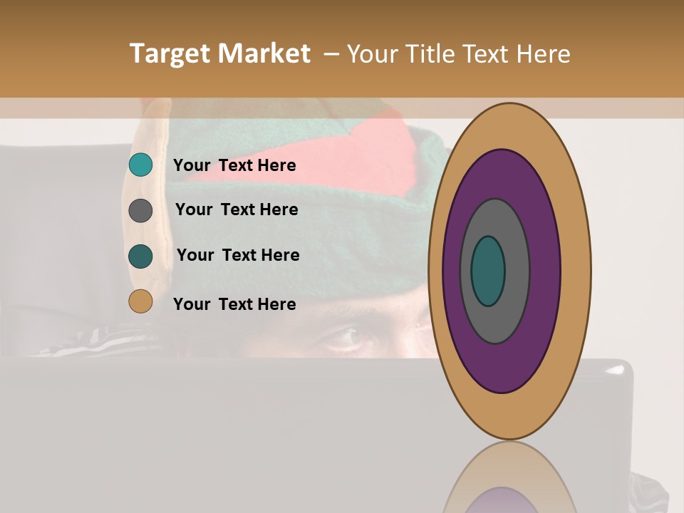 A Man Wearing A Elf Hat Sitting In Front Of A Laptop PowerPoint Template