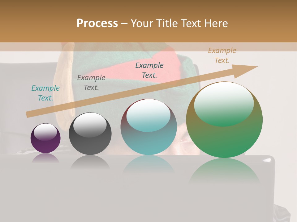A Man Wearing A Elf Hat Sitting In Front Of A Laptop PowerPoint Template