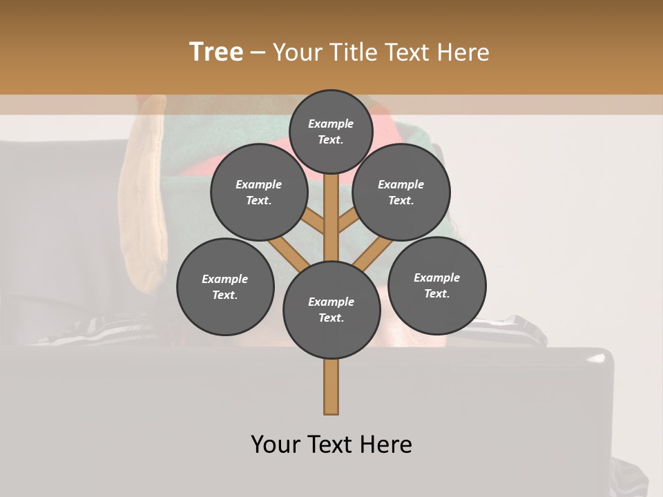 A Man Wearing A Elf Hat Sitting In Front Of A Laptop PowerPoint Template