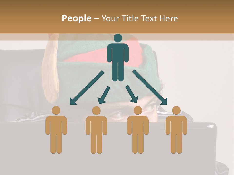 A Man Wearing A Elf Hat Sitting In Front Of A Laptop PowerPoint Template