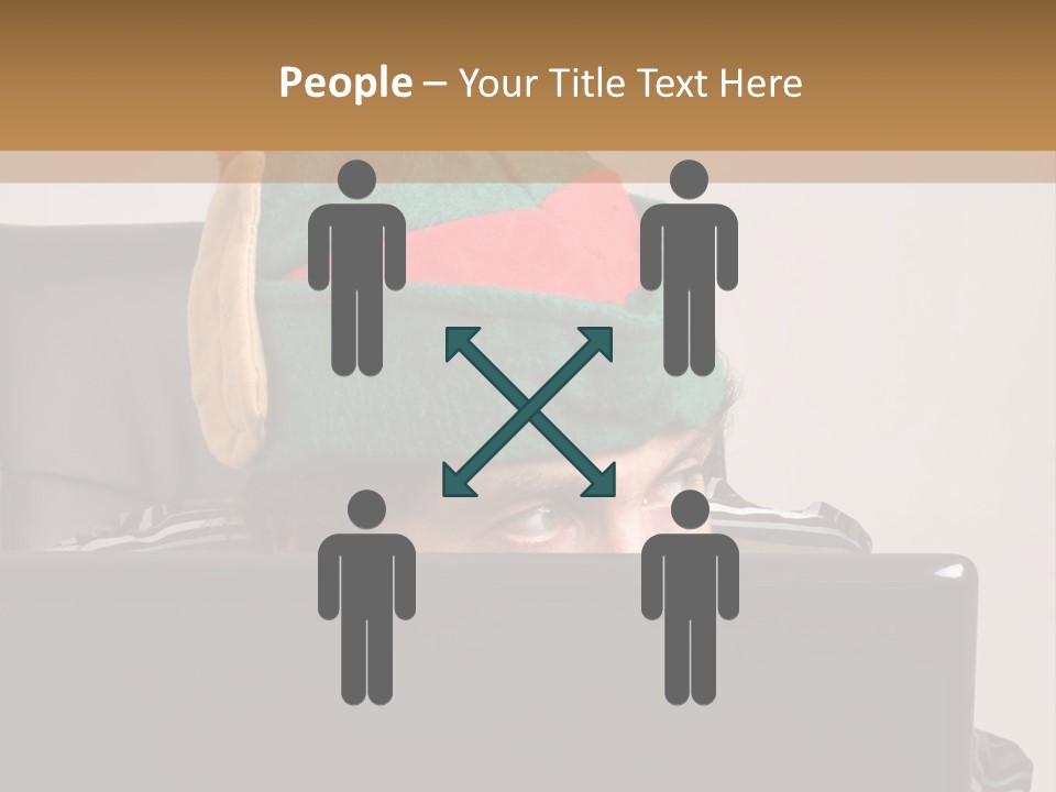 A Man Wearing A Elf Hat Sitting In Front Of A Laptop PowerPoint Template