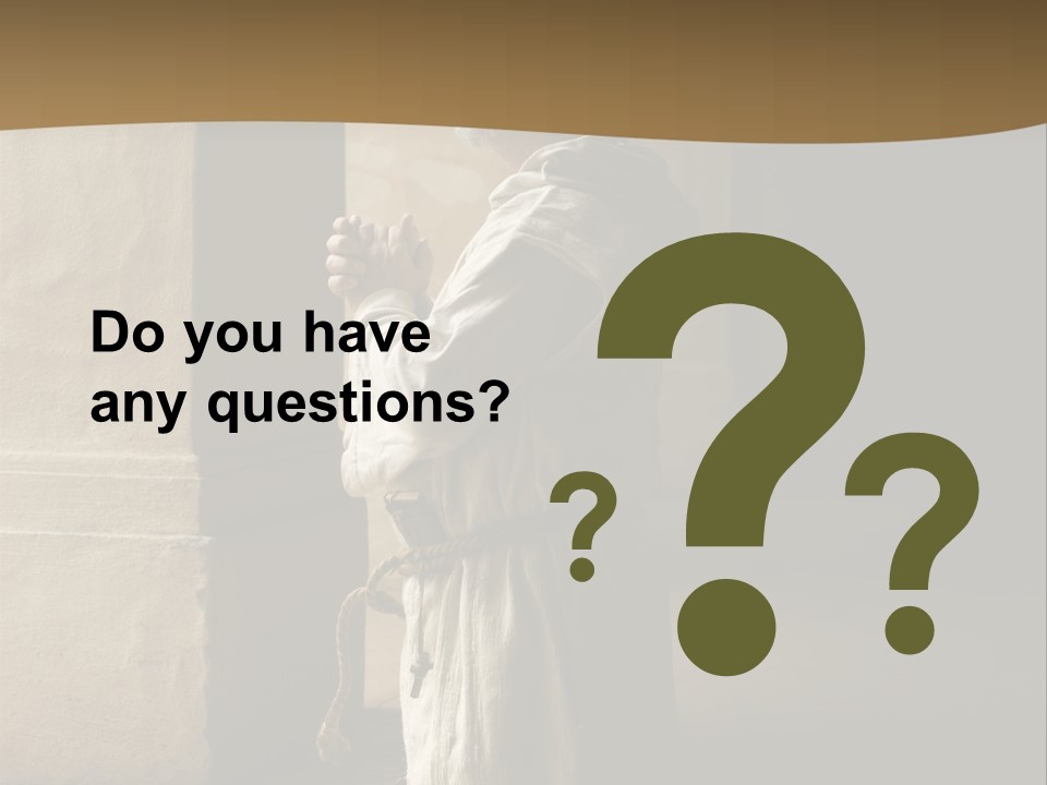 A Man Sitting On The Ground In Front Of A Building PowerPoint Template