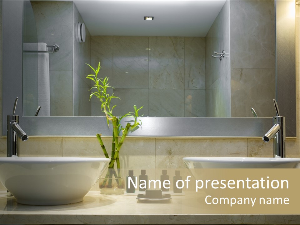 A Bathroom With Two Sinks And A Bamboo Plant PowerPoint Template