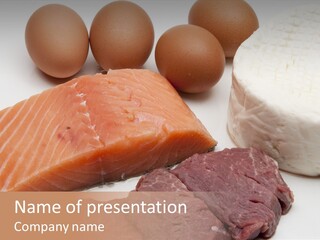 A Plate Of Meat, Eggs, And Cheese On A Table PowerPoint Template