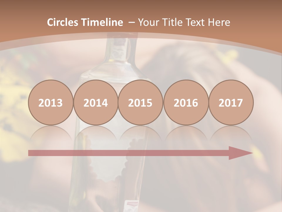 A Bottle Of Vodka Sitting On Top Of A Table PowerPoint Template