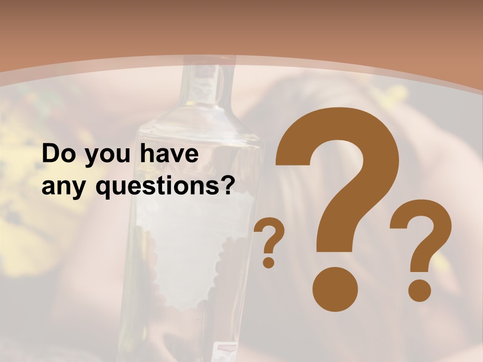 A Bottle Of Vodka Sitting On Top Of A Table PowerPoint Template