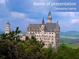 A Castle Is Shown With Trees In Front Of It PowerPoint Template