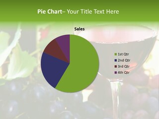 A Glass Of Red Wine Next To A Bunch Of Grapes PowerPoint Template