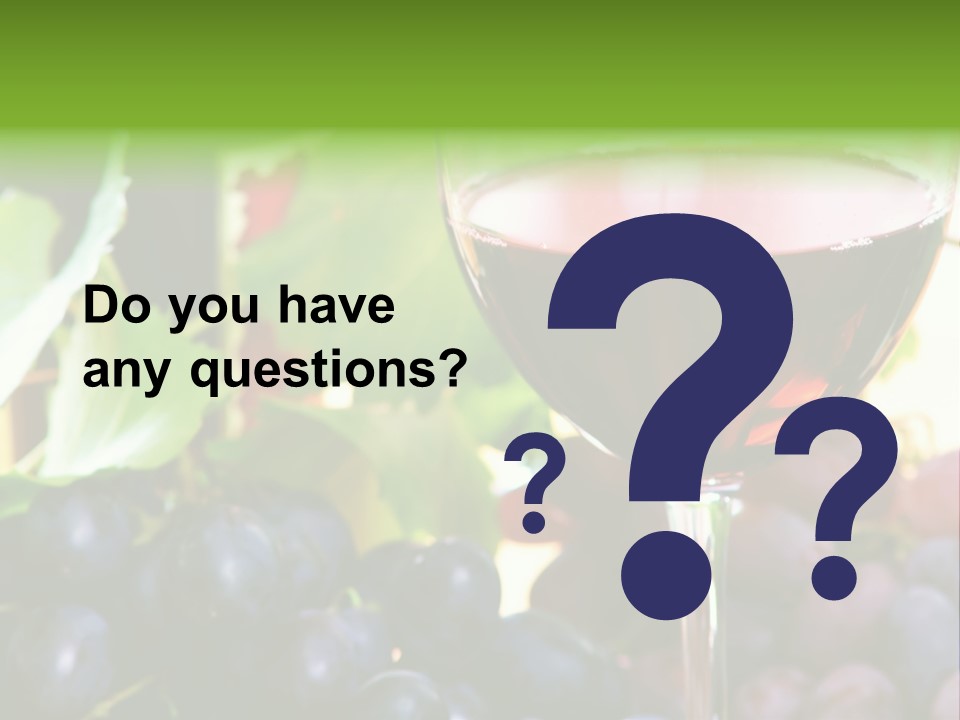 A Glass Of Red Wine Next To A Bunch Of Grapes PowerPoint Template