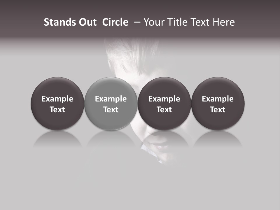 A Young Boy Is Smiling For The Camera PowerPoint Template