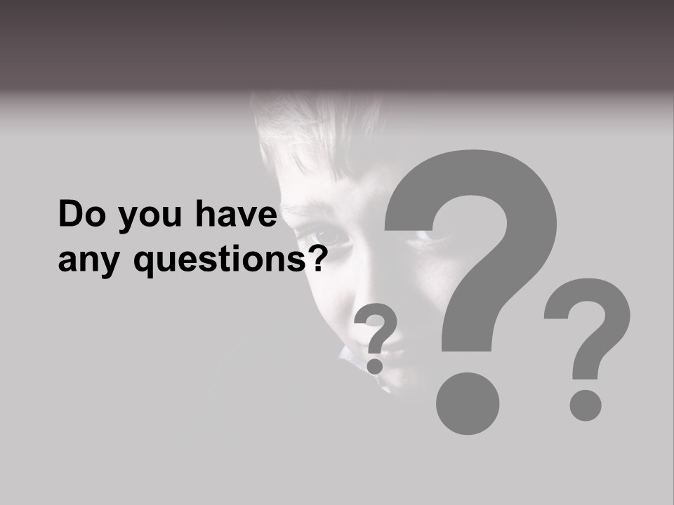 A Young Boy Is Smiling For The Camera PowerPoint Template