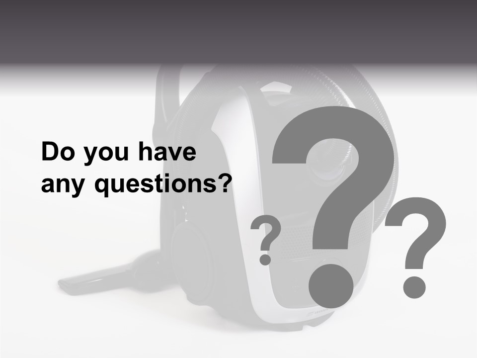 A Black And White Vacuum Is On Display PowerPoint Template