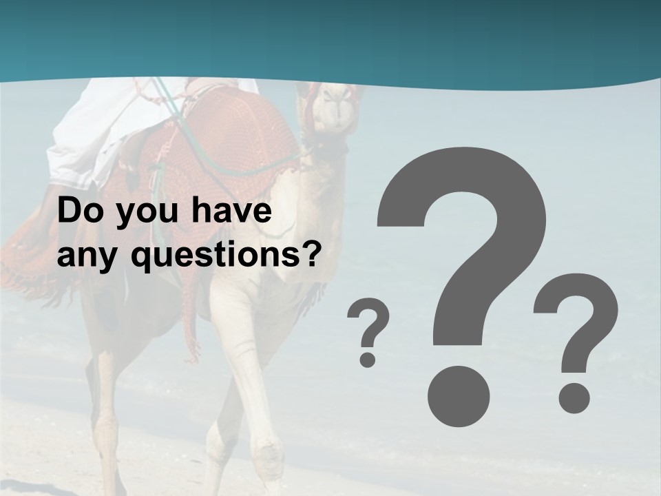 A Person Riding A Camel On A Beach PowerPoint Template