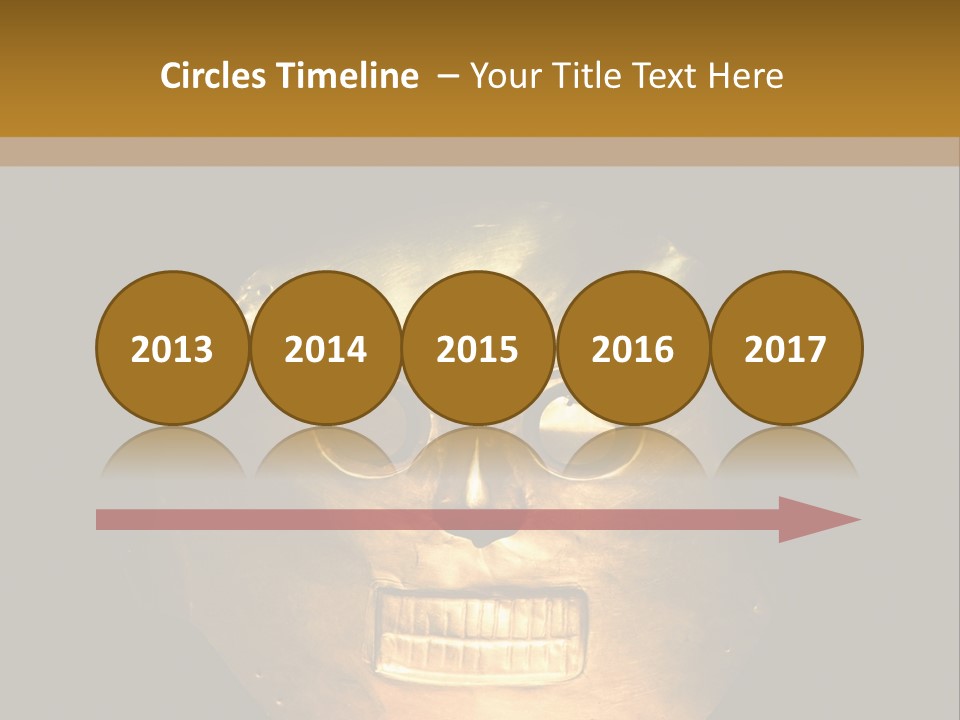 A Gold Mask With A Face On It PowerPoint Template