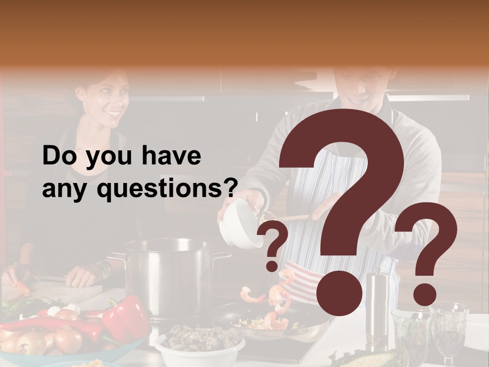 A Man And Woman Preparing Food In A Kitchen PowerPoint Template