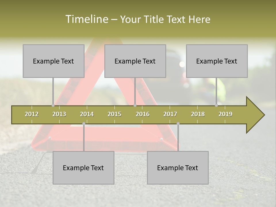 A Red Triangle Sign Sitting On The Side Of A Road PowerPoint Template
