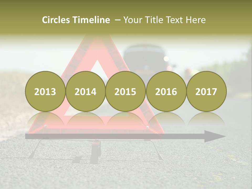 A Red Triangle Sign Sitting On The Side Of A Road PowerPoint Template