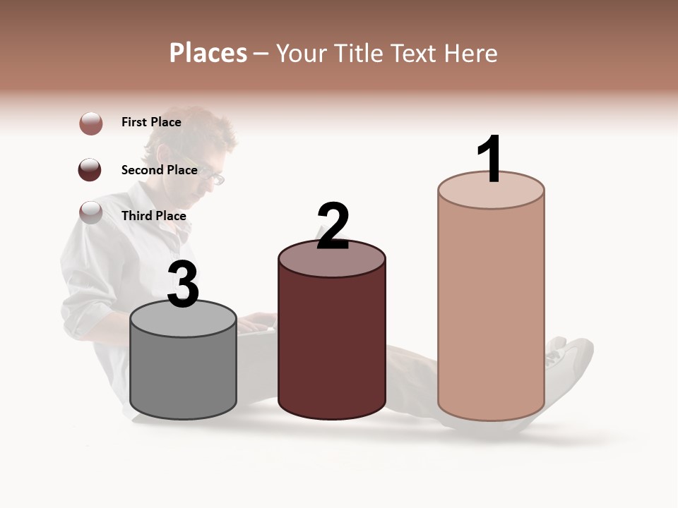 A Man Sitting On The Floor Using A Laptop Computer PowerPoint Template