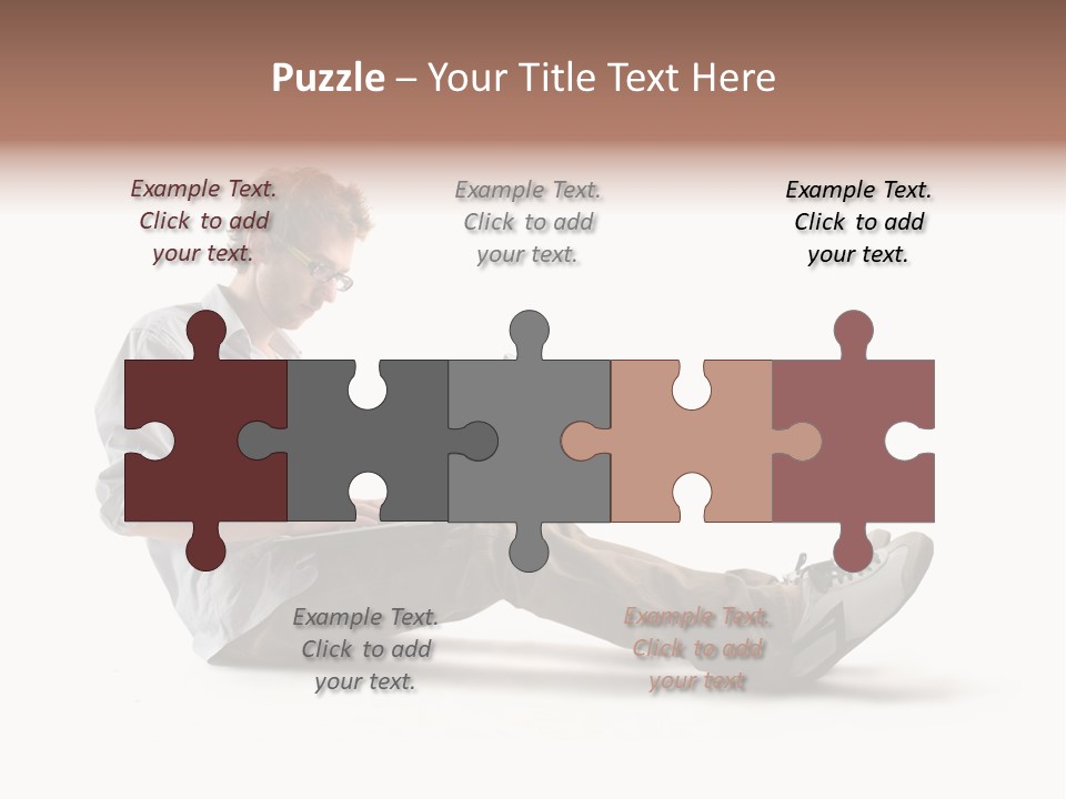 A Man Sitting On The Floor Using A Laptop Computer PowerPoint Template