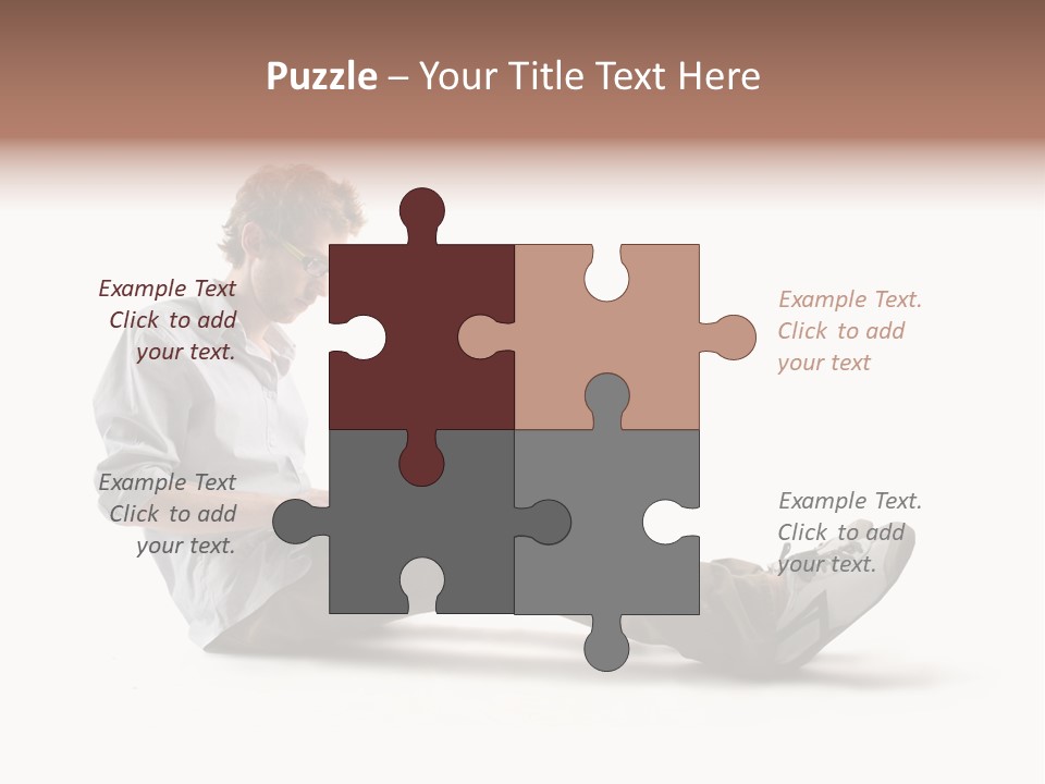 A Man Sitting On The Floor Using A Laptop Computer PowerPoint Template