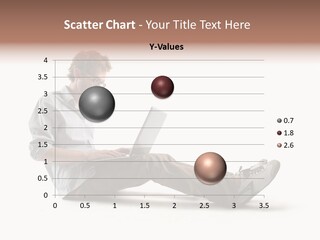 A Man Sitting On The Floor Using A Laptop Computer PowerPoint Template