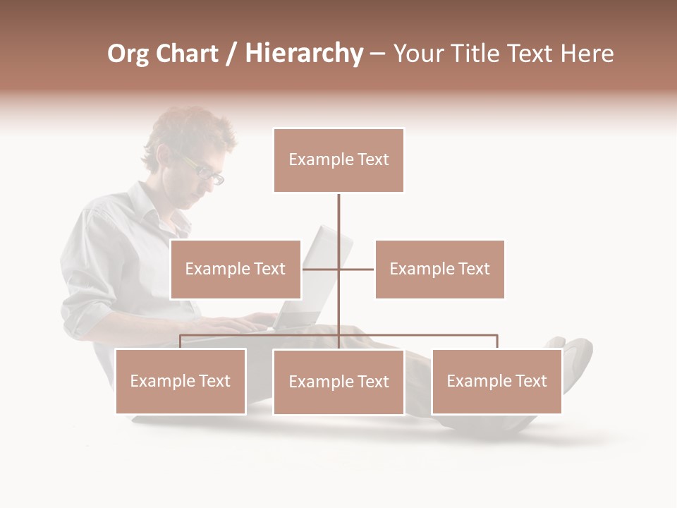 A Man Sitting On The Floor Using A Laptop Computer PowerPoint Template