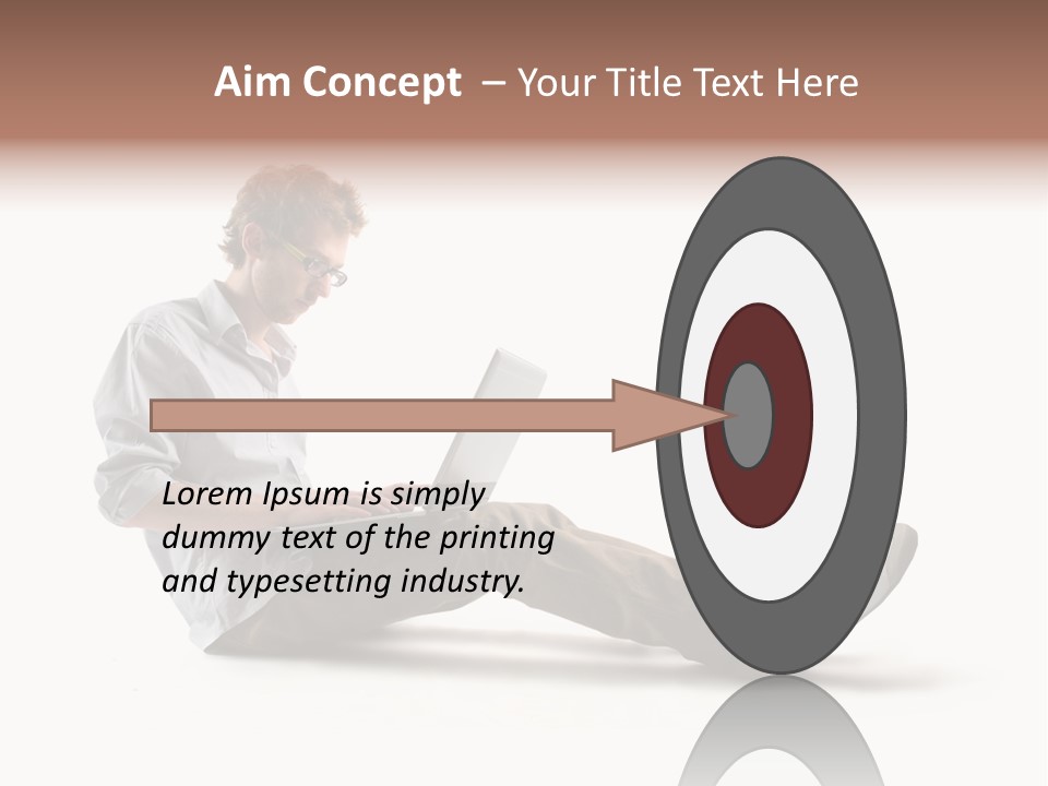 A Man Sitting On The Floor Using A Laptop Computer PowerPoint Template