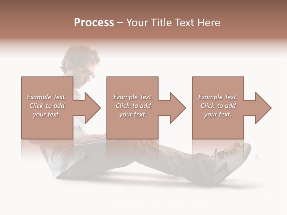 A Man Sitting On The Floor Using A Laptop Computer PowerPoint Template