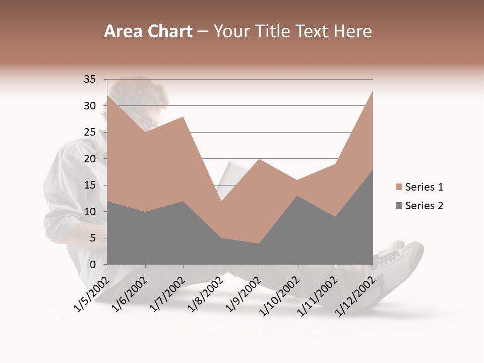 A Man Sitting On The Floor Using A Laptop Computer PowerPoint Template