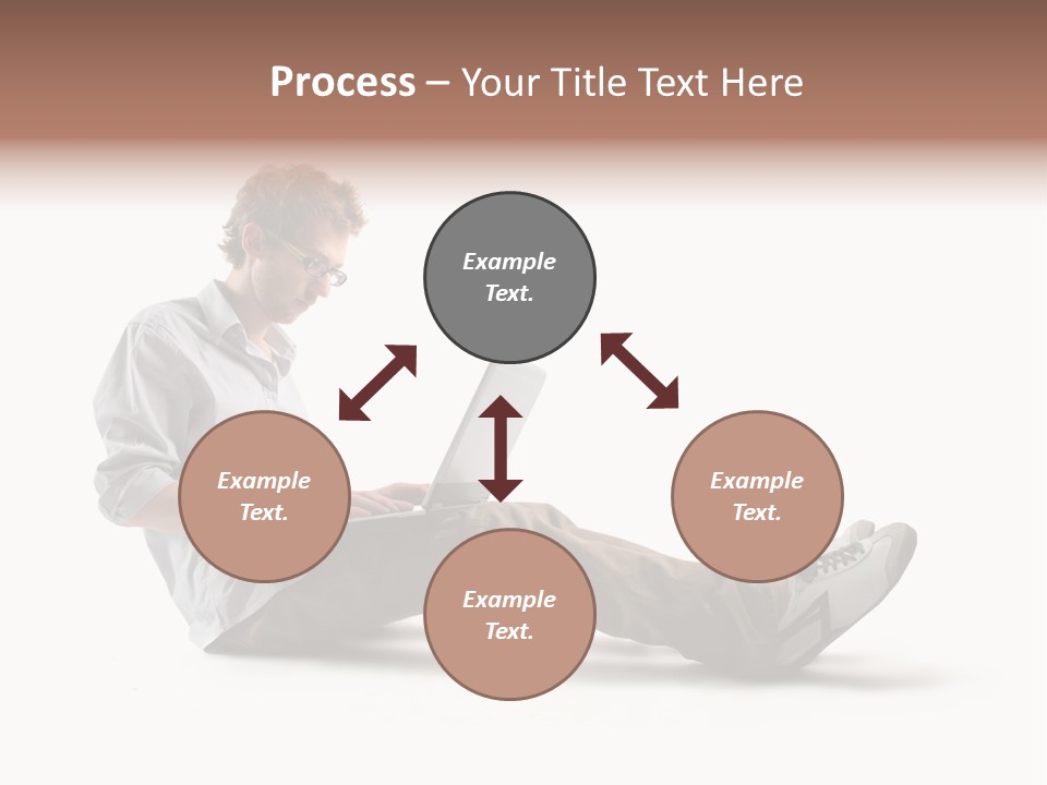 A Man Sitting On The Floor Using A Laptop Computer PowerPoint Template