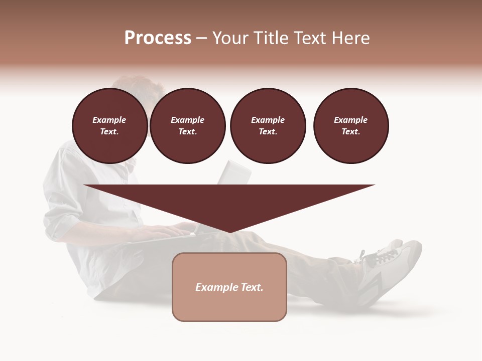 A Man Sitting On The Floor Using A Laptop Computer PowerPoint Template