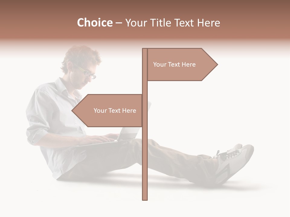 A Man Sitting On The Floor Using A Laptop Computer PowerPoint Template