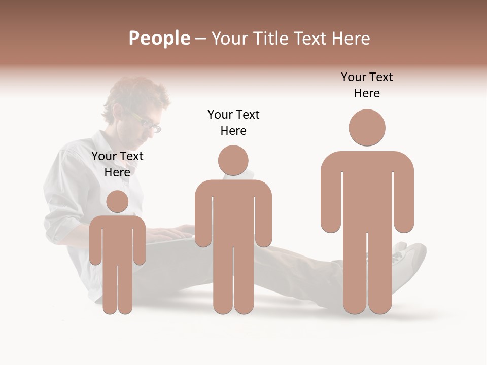 A Man Sitting On The Floor Using A Laptop Computer PowerPoint Template