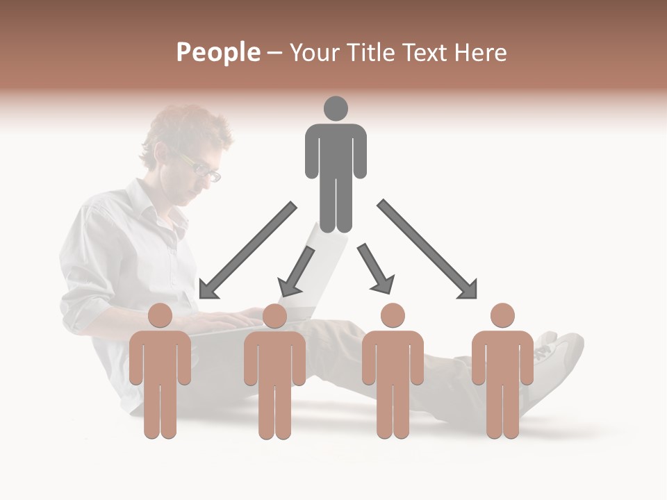 A Man Sitting On The Floor Using A Laptop Computer PowerPoint Template